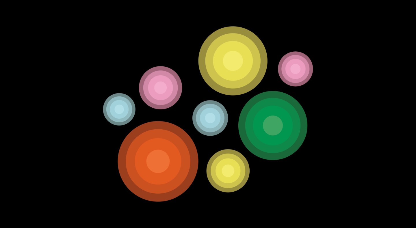 Abstract design on a black background featuring colorful circles of varying sizes. The circles gradually fade out, creating a ripple-like effect that adds depth and vibrancy to the composition.