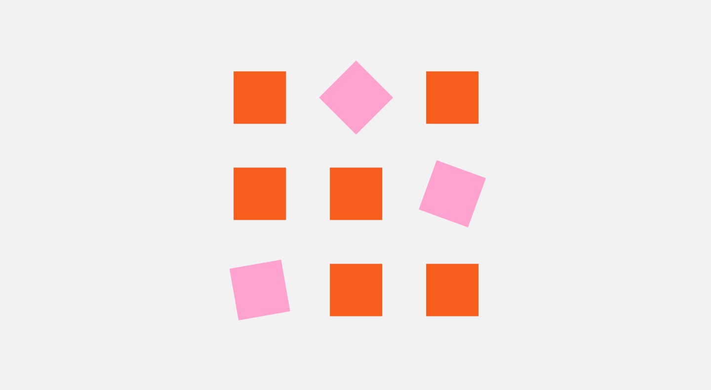 9 squares in a 3x3 formation with 3 of the squares in a pink colour slightly rotated so that they don't align with the 6 orange squares, on a light grey background.