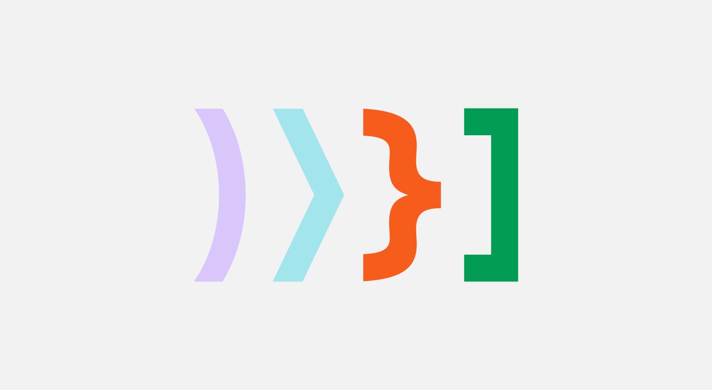 4 different types of brackets used in website development and coding in a line on a grey background. The brackets are in purple, blue, orange and green.