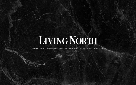 Living North logo on black marble background